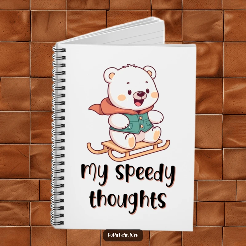 Funny polar bear notebook in a vest, looking delighted while zooming on a mini sled, ideal for jotting down adventurous ideas.